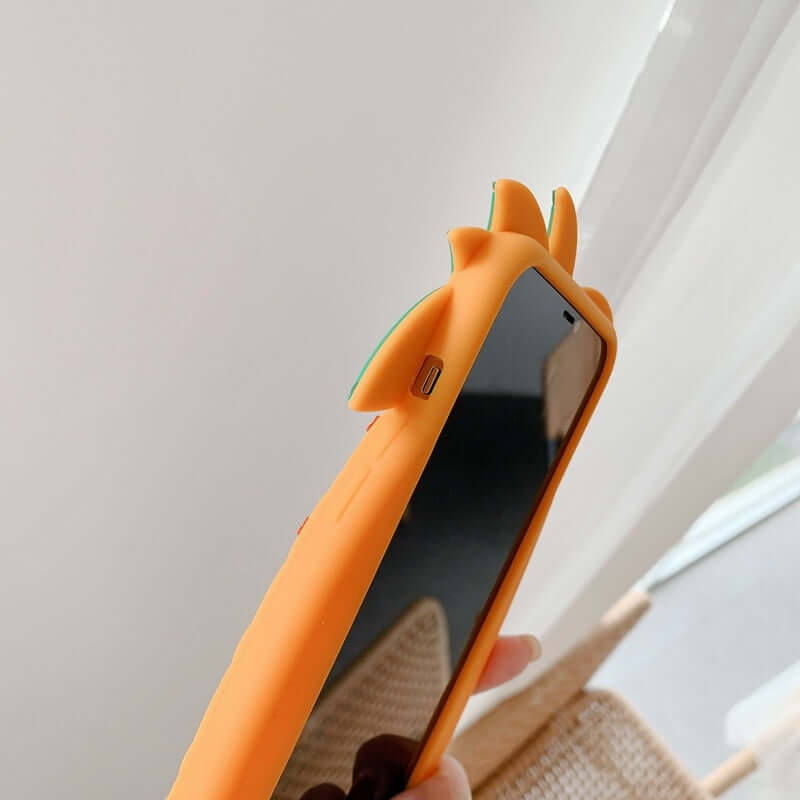 Silicone phone case in the shape of a pineapple, highlighting anti-drop protection for smartphones.