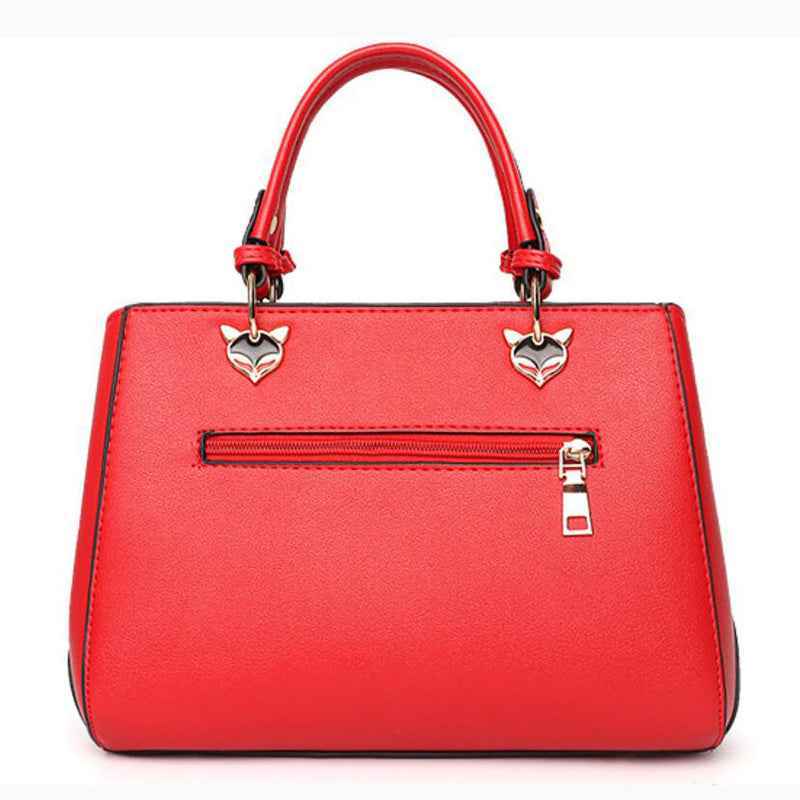 Women’s Patchwork Handbag with Hairball Ornament