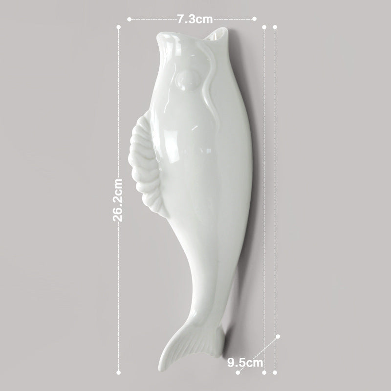 Simple modern ceramic wall goldfish vase wall decoration with dimensions 7.3cm x 26.2cm x 9.5cm.