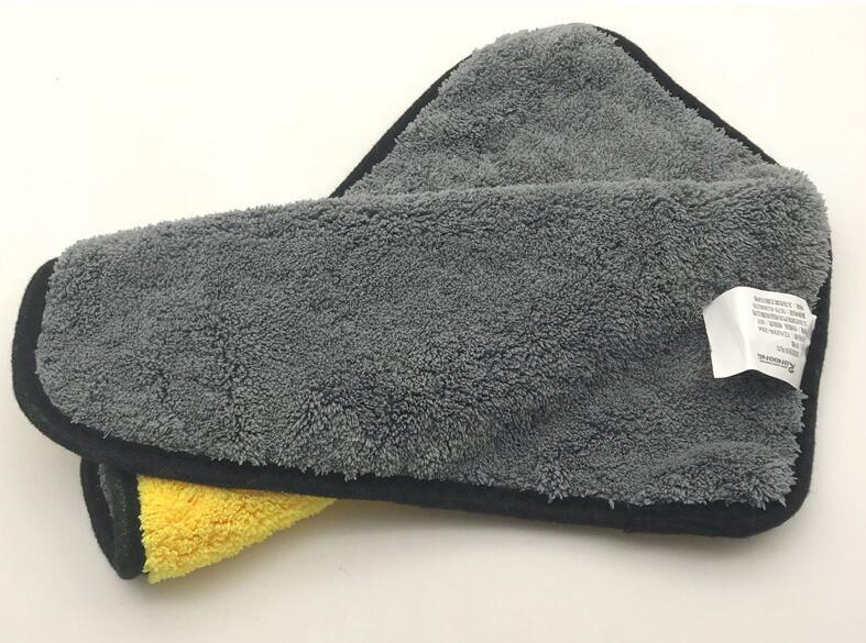 Two-color double-sided car wash towel for clean surfaces, featuring soft microfiber material and silk banded edges.
