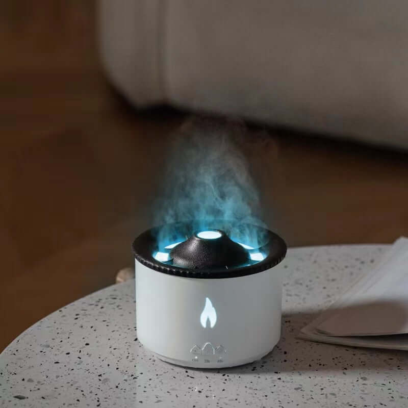 Volcano Flame Ultrasonic Essential Oil Humidifier & Diffuser with mist and flame light on a table