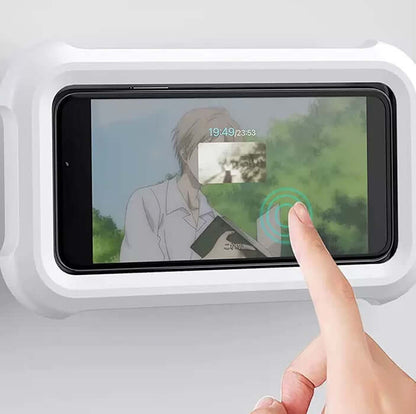 Waterproof mobile phone rack on wall with touch interaction, perfect for bathroom use.