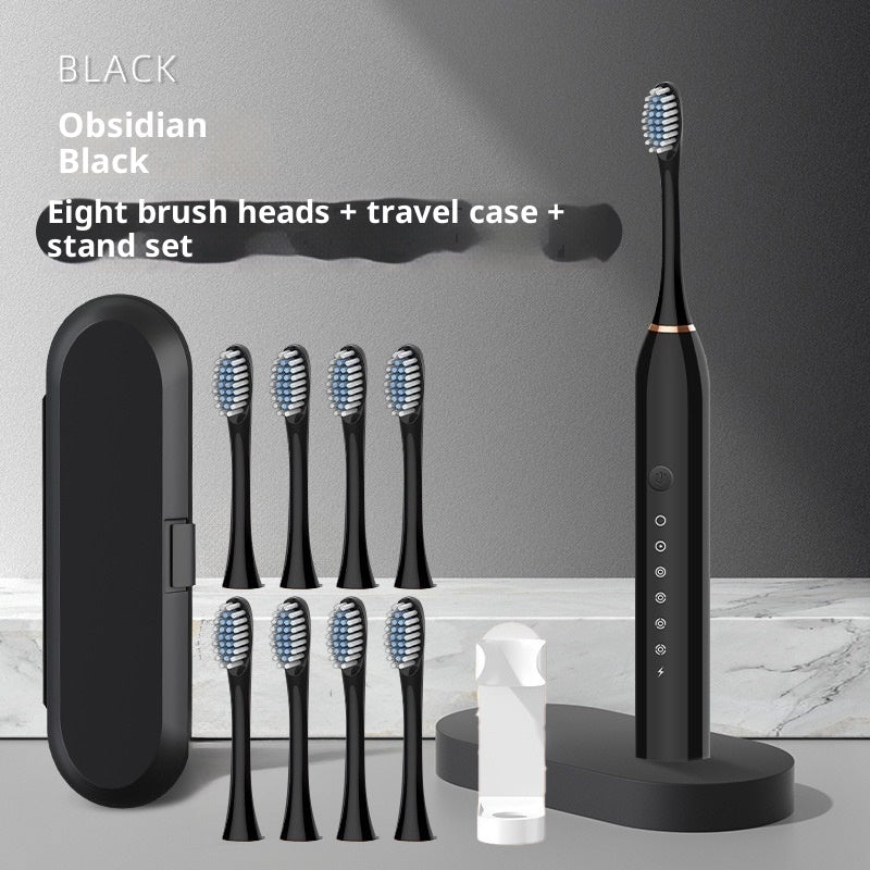 Soft-bristle toothbrush rechargeable automatic electric toothbrush with eight brush heads and travel case.