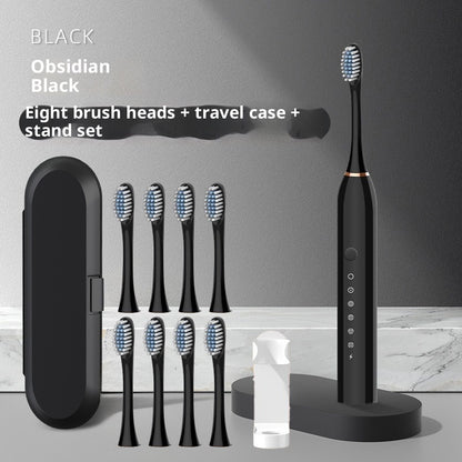Soft-bristle toothbrush rechargeable automatic electric toothbrush with eight brush heads and travel case.