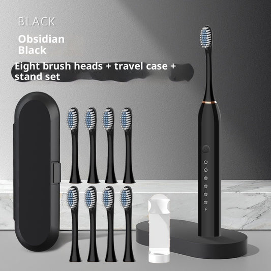 Soft-bristle toothbrush rechargeable automatic electric toothbrush with eight brush heads and travel case.