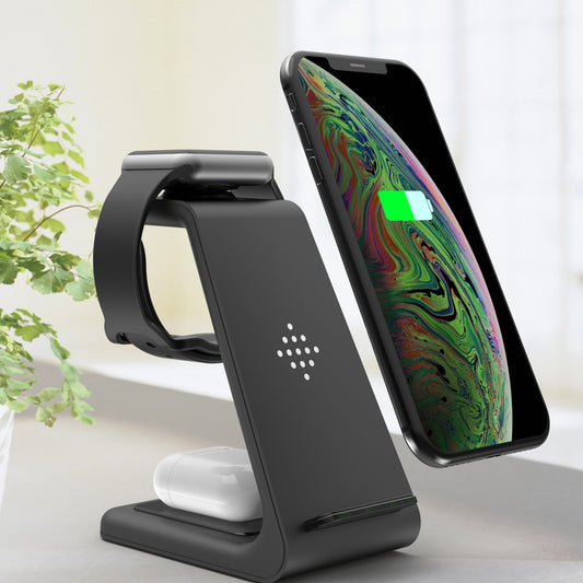 Wireless charger stand with phone and smartwatch, fast charging dock for multiple devices.