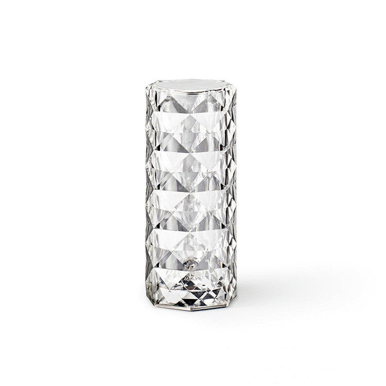 Nordic crystal lamp design with elegant diamond-like facets, ideal for creating atmospheric lighting in bedrooms.
