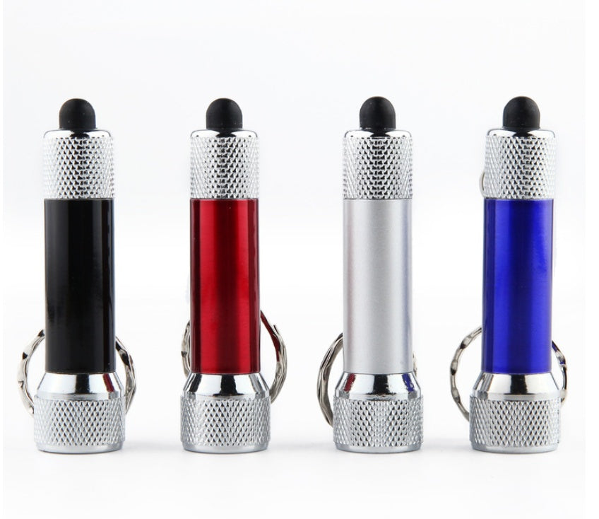 Set of portable LED torches keychain in black, red, silver, and blue; ideal for emergency lighting.
