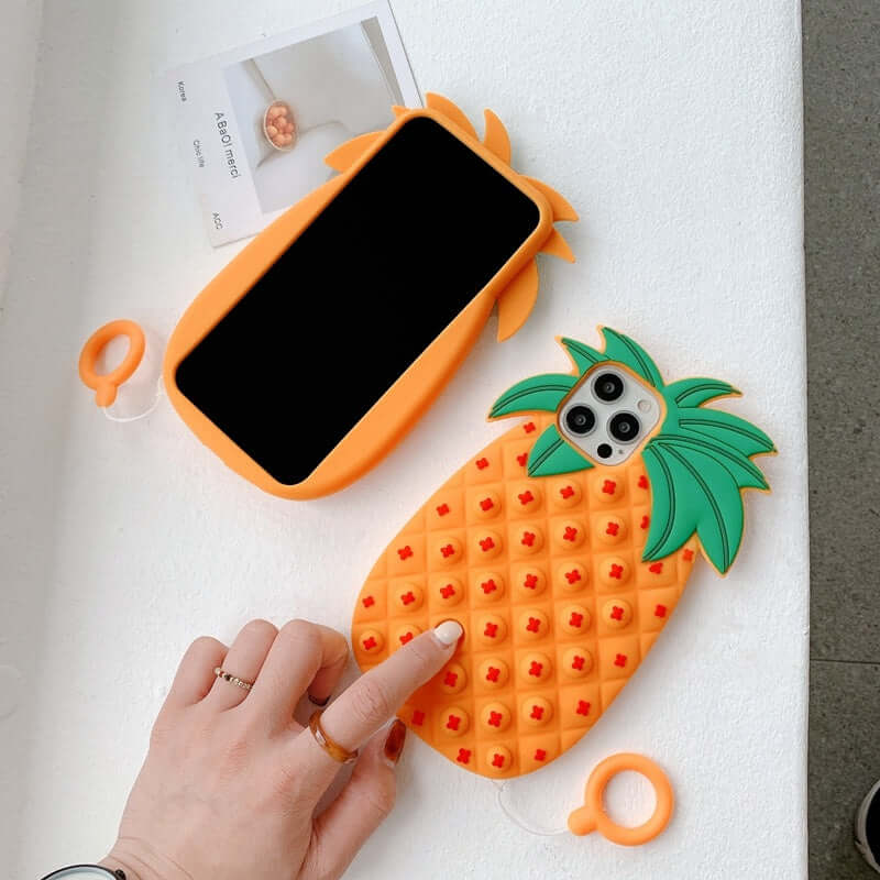 Silicone phone case with pineapple design, anti-drop protective case for Apple models in vibrant orange color.